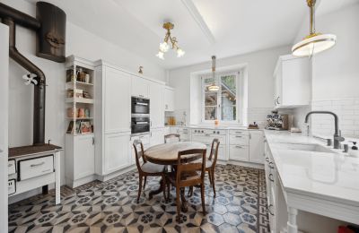 Demeure historique à vendre Biel/Bienne, Alpenstrasse 95, Berne, Moderne trifft auf Nostalgie: Küche mit Guss-Holzofen